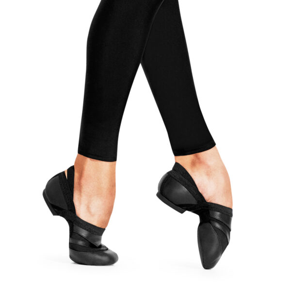 Model posing in Black capezio jazz dance shoes, side view