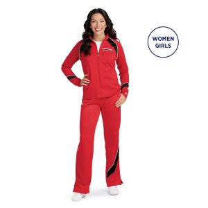 Smiling model standing in Champion Nova Warm Up Pants with coordinating jacket, front view