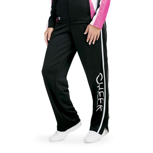 Model wearing Champion Break Out Warm Up Pants with coordinating pants, front three-quarters detail of decoration