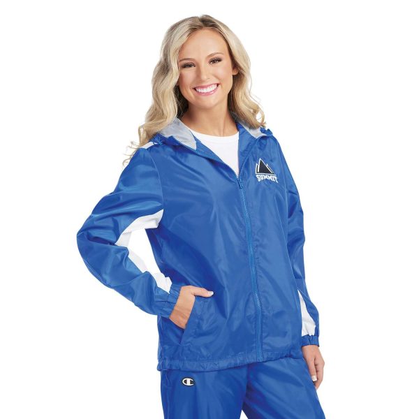 Model standing in Champion Quest Warm Up Jacket with coordinating Pants, front three-quarters view