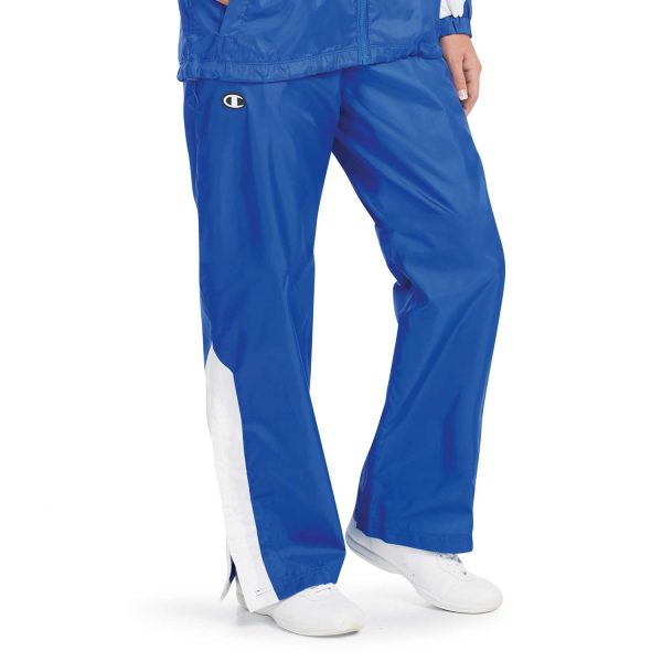 Model in Champion Quest Warm Up Pants with coordinating jacket, front detail