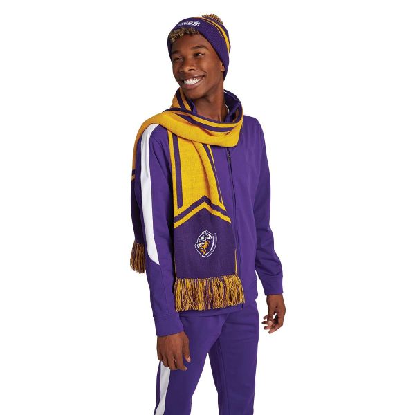 smiling model wearing a Holloway Homecoming Beanie with coordinating warmups and scarf, front three-quarters view