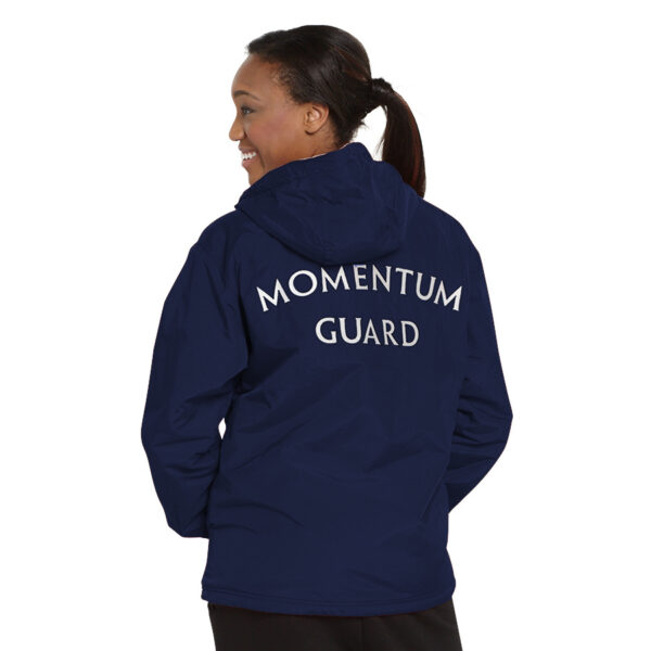 Model wearing a decorated navy Charles River Enterprise Jacket, back view