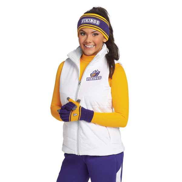 Model smiling in a decorated white Port Authority Puffy Vest with coordinating pants and accessories, front view