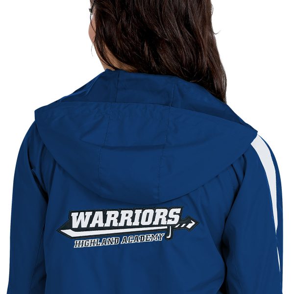 blue warmup jacket with a female model, back detail