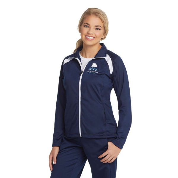 Model wearing a Women's Navy/White Sport-Tek Tricot Track Jacket, front three-quarters view