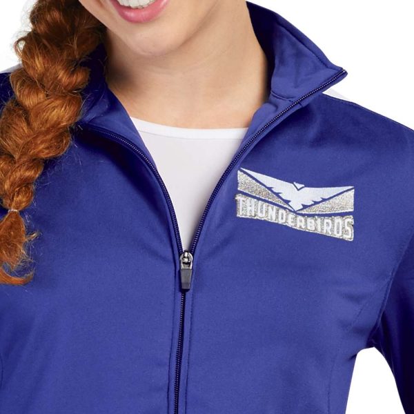 Female model wearing a Purple/White Women's Augusta Medalist 2.0 Jacket, left chest decoration detail