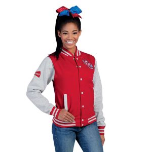 Smiling cheer model wearing a red/grey AWDis Letterman Jacket, front view