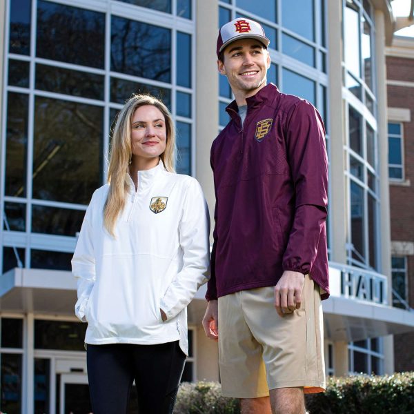 man and woman standing on a college campus in Holloway SeriesX Pullovers