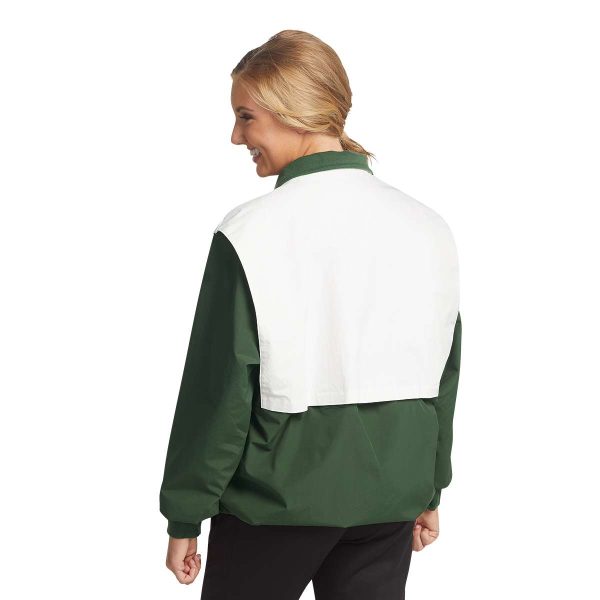 model wearing a green and white Charles River Championship Jacket, back view