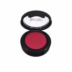 bright red ben nye eye makeup in an open black compact