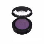 purple ben nye eye makeup in an open black compact