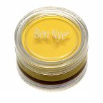 sun yellow ben nye creme makeup in a clear compact