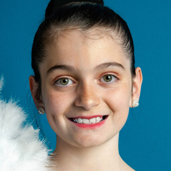 front view of model wearing pearl rosette earrings model