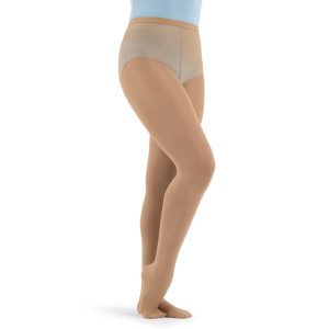 Model wearing caramel capezio hold and stretch footed tight, front three-quarters view