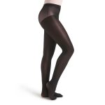 Model wearing black capezio ultra shimmery footed tight, side view