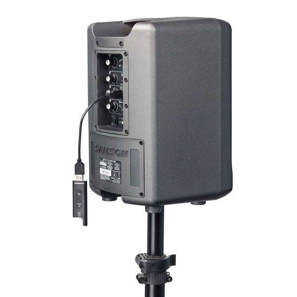 Samson XPD2 Digital Wireless Handheld Microphone with receiver attached to a portable PA