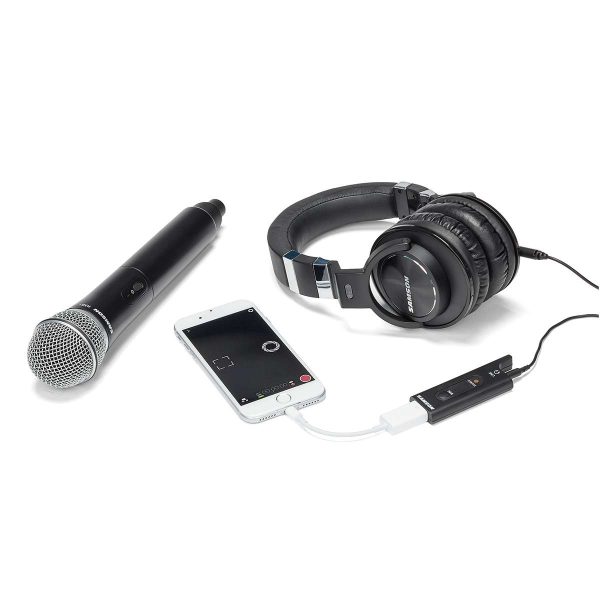 Samson XPD2 Digital Wireless Handheld Microphone with receiver attached to an iphone and headphones