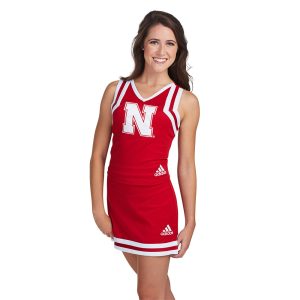 model wearing a red and white adidas custom cheer uniform
