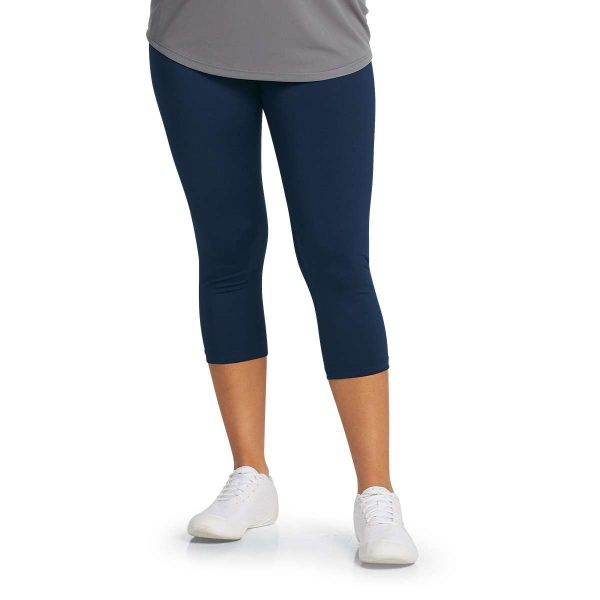 model posing in navy Augusta Hyperform Compression Capris, front detail