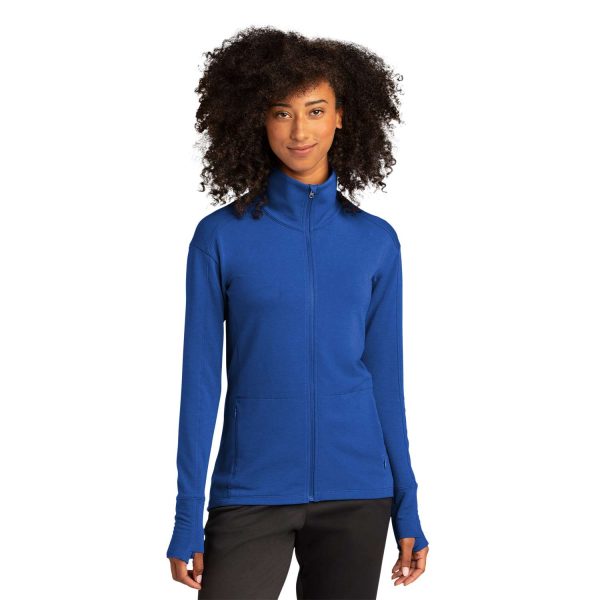 model posing in a royal blue Sport-Tek Sport-Wick Flex Fleece Jacket, front view