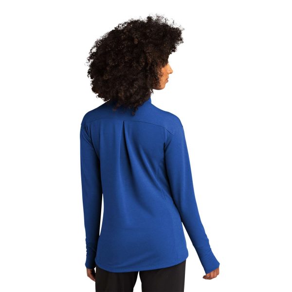 model posing in a royal blue Sport-Tek Sport-Wick Flex Fleece Jacket, back view