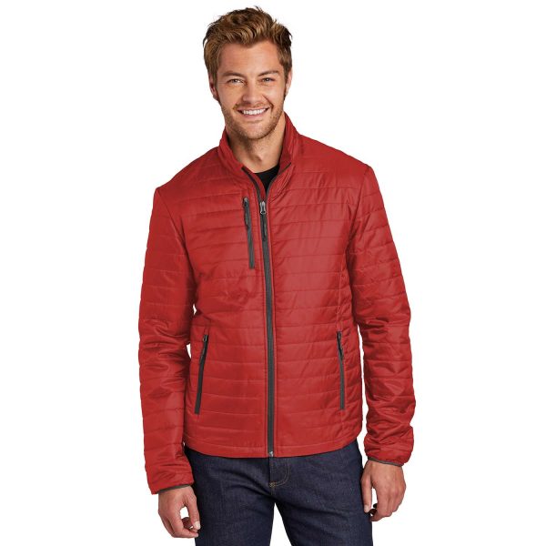 male model wearing a red Port Authority Packable Puffy Jacket, front view