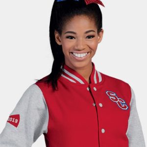 pretty young African American girl in a letterman style warmup jacket.