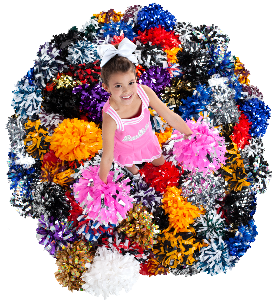 young cheerleader in a pink uniform standing in a pile of colorful poms
