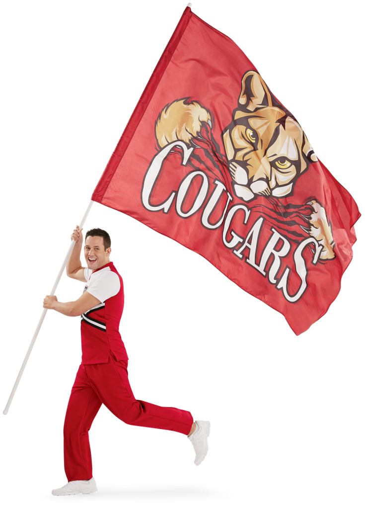 Male cheerleader holding a large spirit flag.